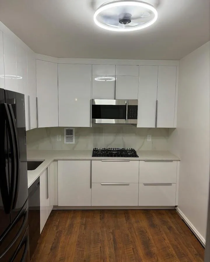 Renovated kitchen with quartz countertops in Watchung